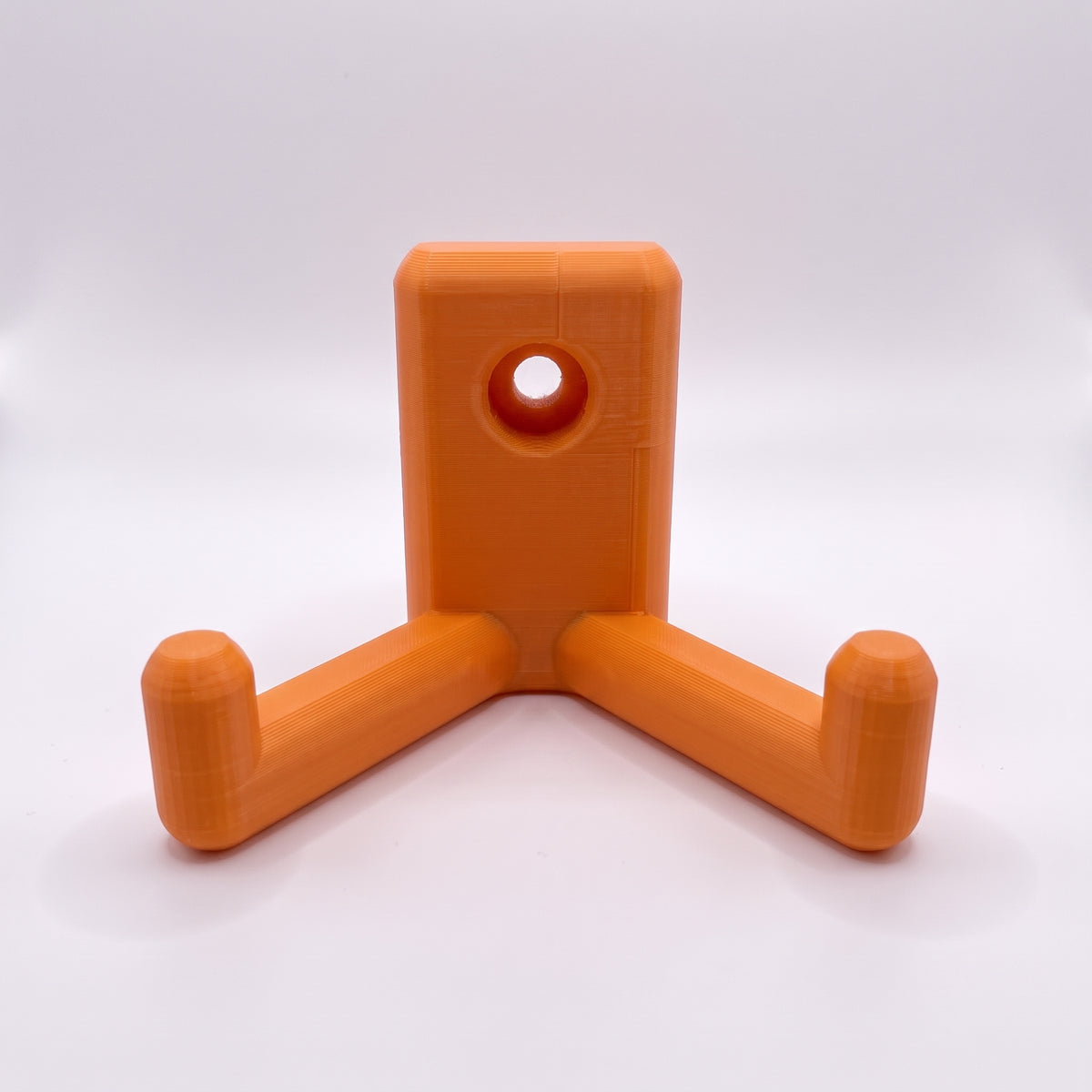 PlateBuddy vægholder til tallerkener i mat orange